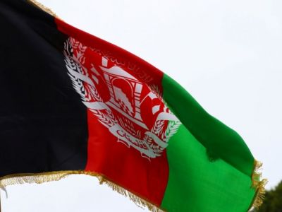 Государственный флаг Афганистана. Фото: Hannah McKay / Reuters