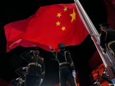 Подъем флага КНР на зимних Олимпийских играх в Пекине, 4.02.22. Фото: AP